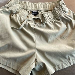 Size medium olive green 3 1/2 inch elastic waste shorts North Face shorts